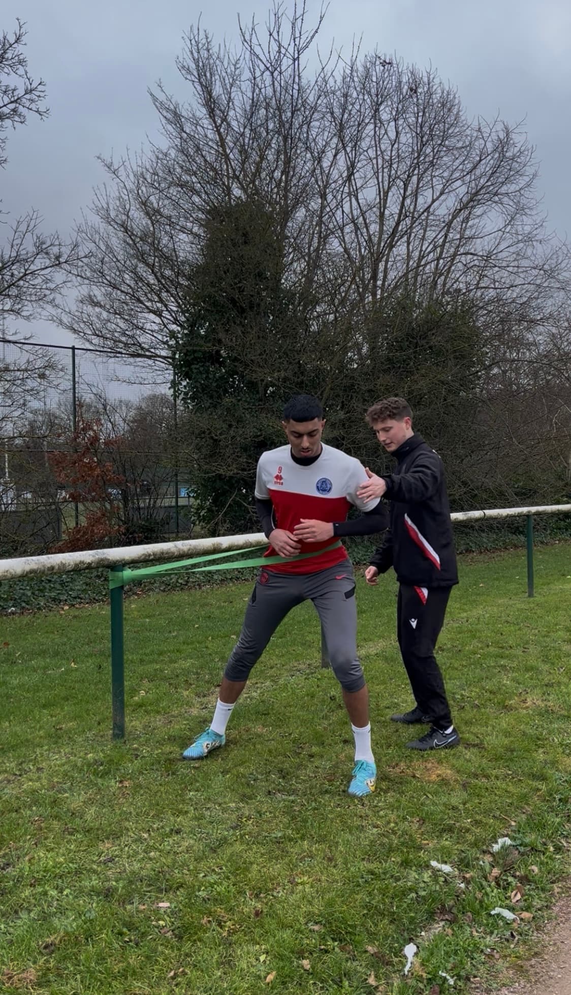 Matt Driver coaching a young athlete